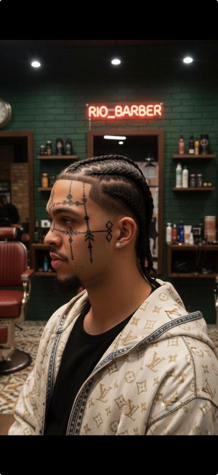 Cornrow braids with detailed hair design at Rio Barbers
