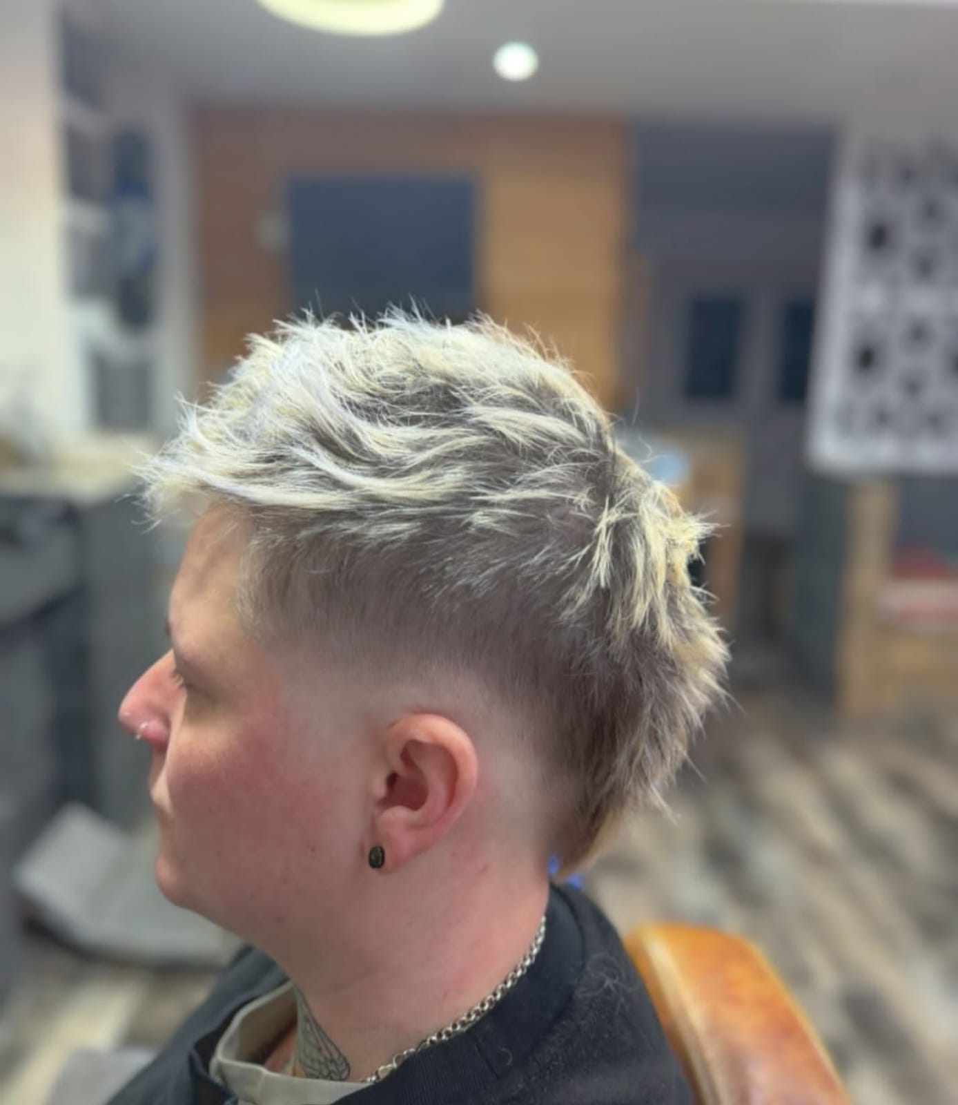 Bleached blonde textured crop with a skin fade