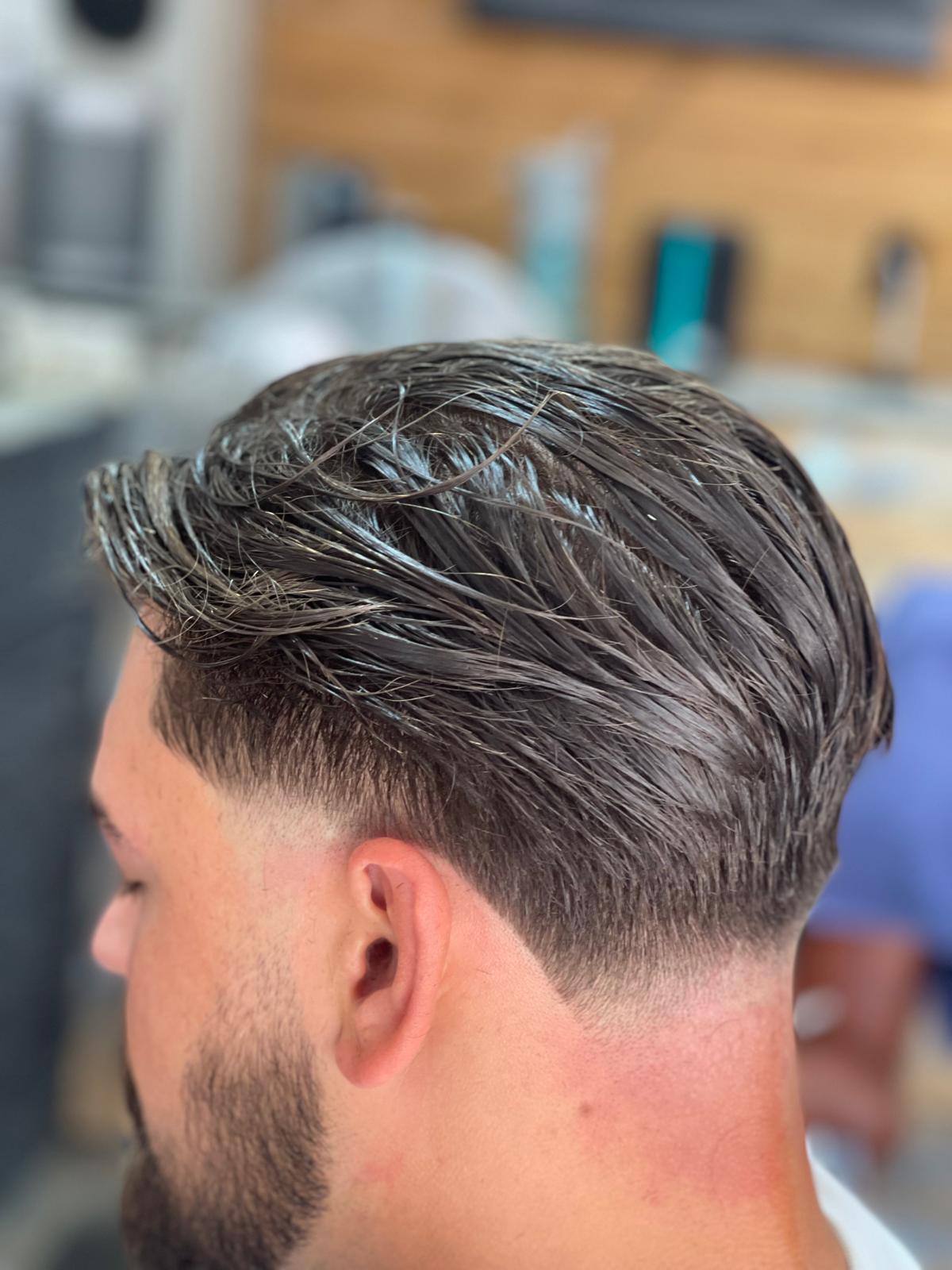 Textured scissor cut with a low taper fade